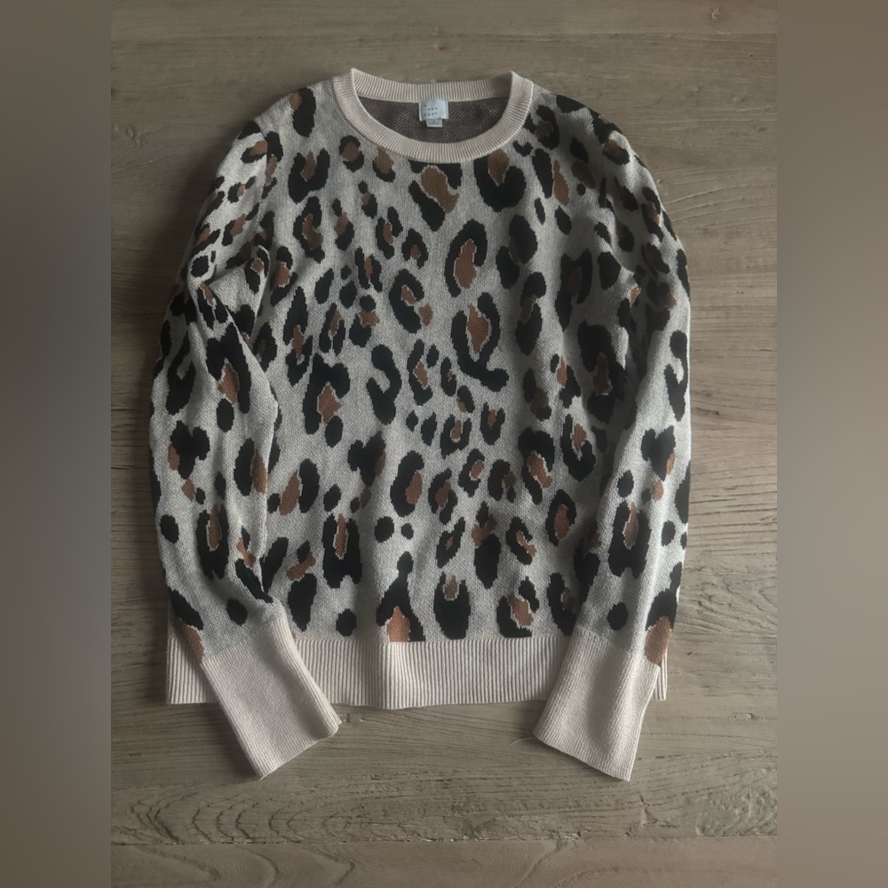 A new day. Leopard Print Sweater